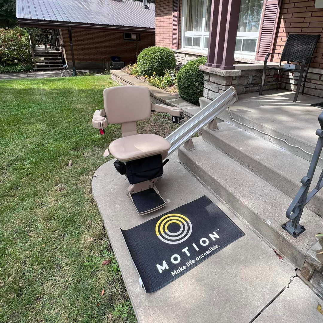 Grey outdoor stairlift with Motion mat.