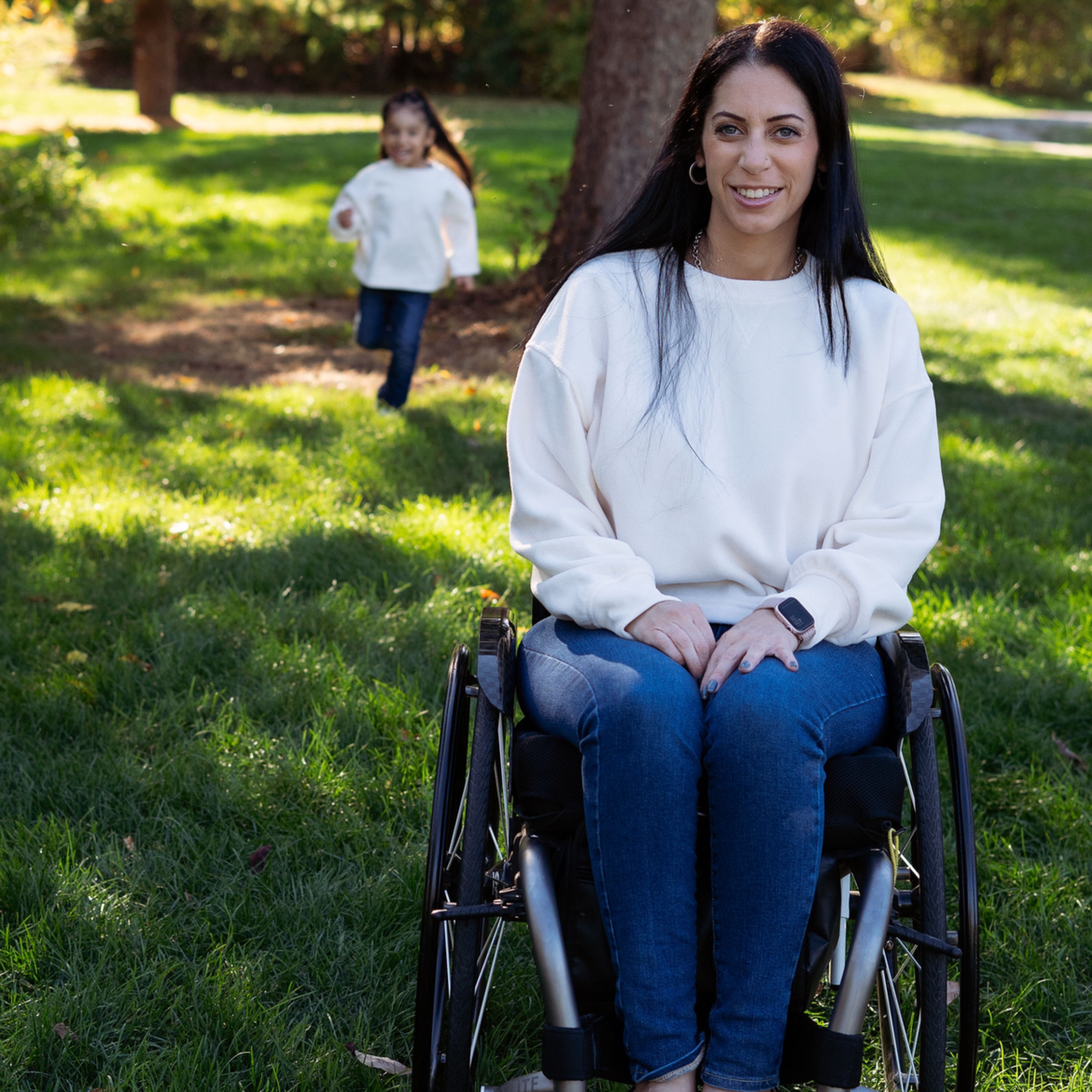 Alicia - Client Ambassador in her wheelchair.